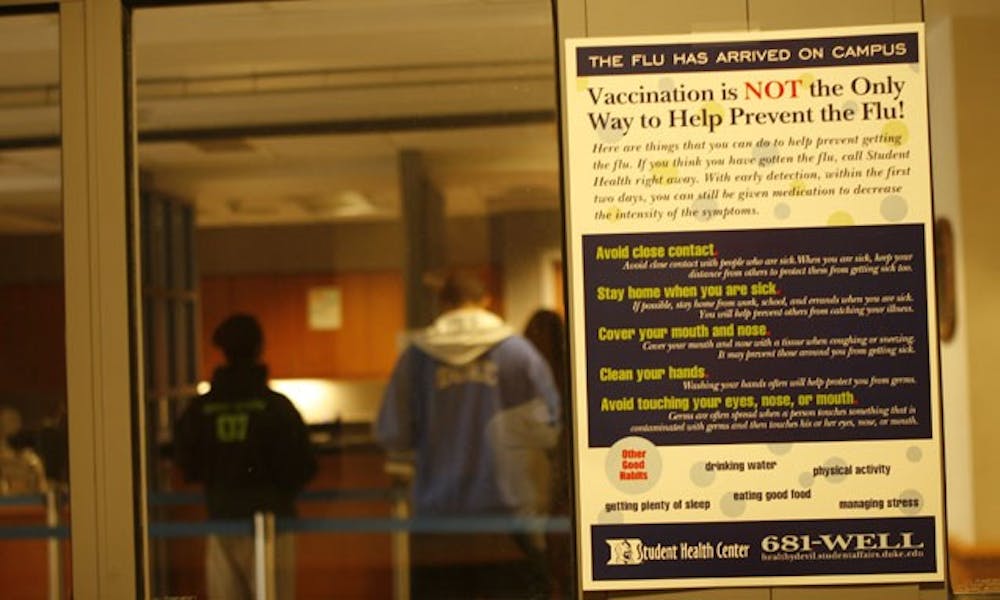 A sign outside the Student Health Center informs visitors of alternative ways to prevent contracting swine flu without receiving vaccination.