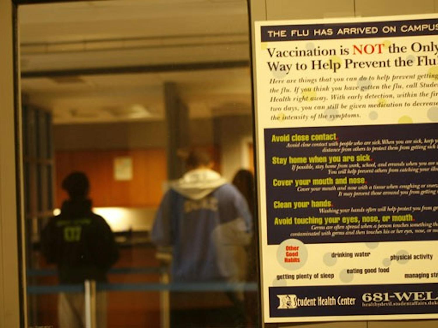 A sign outside the Student Health Center informs visitors of alternative ways to prevent contracting swine flu without receiving vaccination.