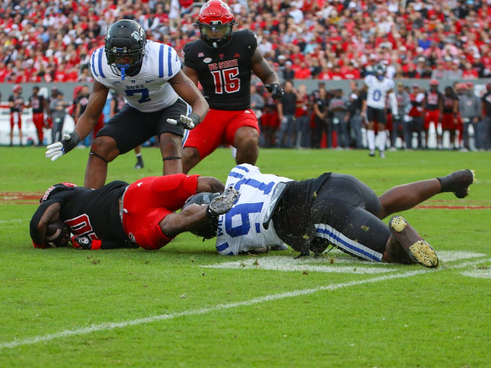 Wesley Williams makes a tackle against N.C. State. 