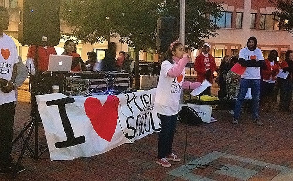 Community members showed their support for public education in light of recent NC legislation.