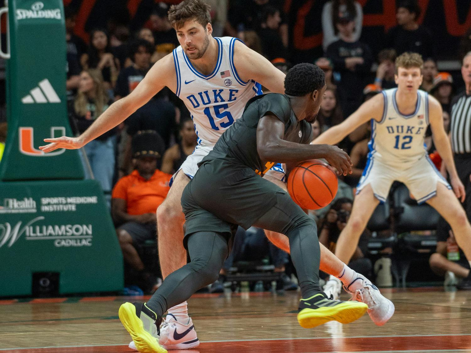 Graduate center Ryan Young plays defense in Duke's game against Miami.