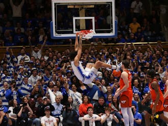 Dereck Lively II hammers home a dunk against Virginia Tech in front of a roaring Duke crowd. 