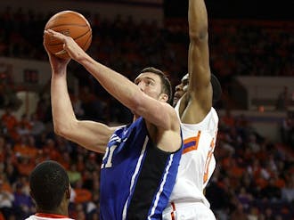 Miles Plumlee helped Duke overcome an early rebounding deficit by grabbing a game-high 14 boards, including eight in the second half.