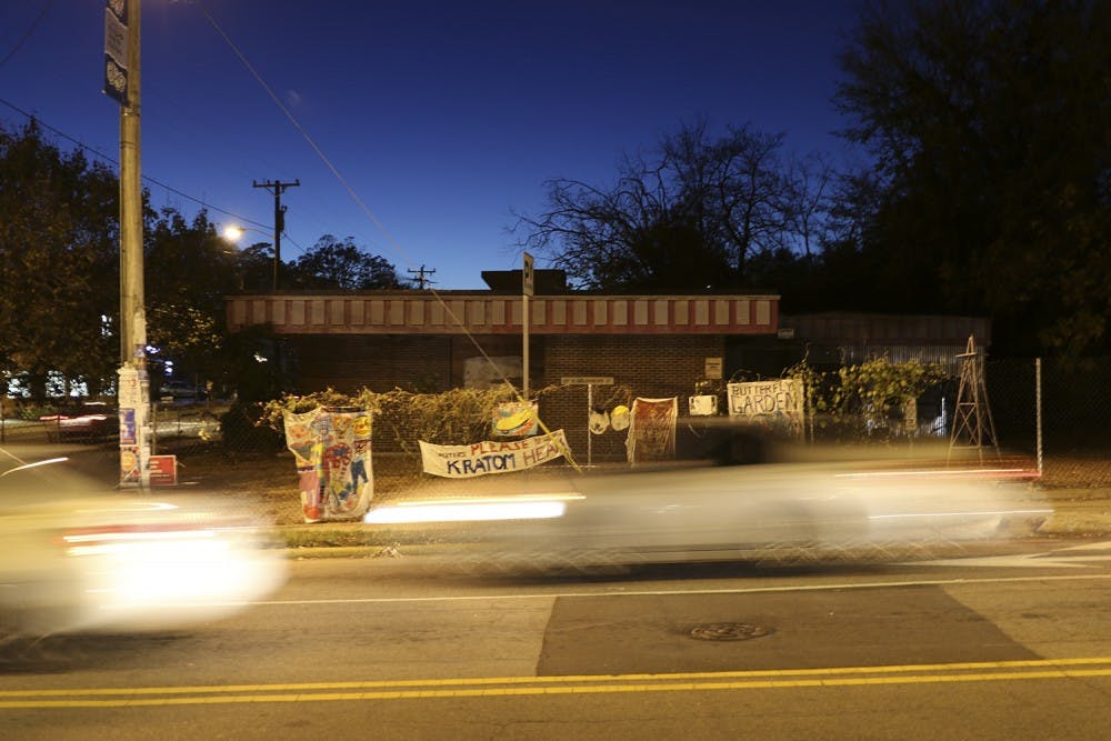 An abandoned building sitting on the corner of West Weaver Street and N. Greensboro&nbsp;Street is owned by CVS