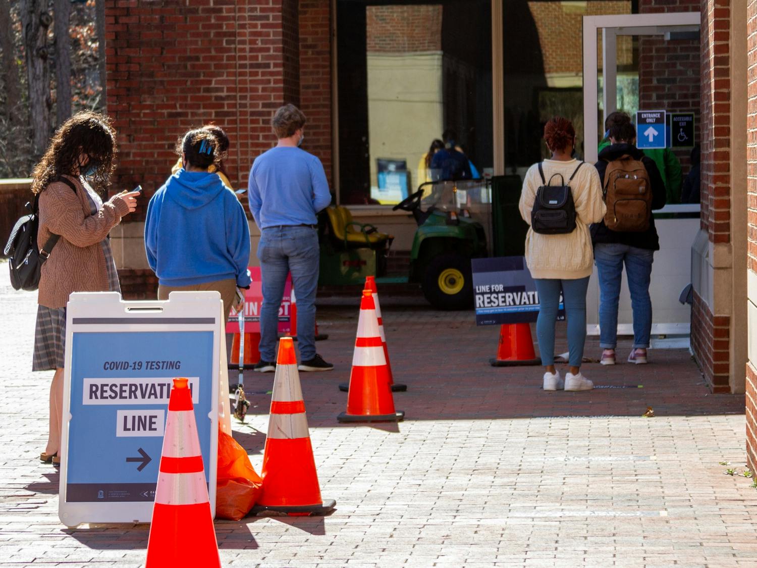 Students line up for COVID testing outside of UNC Rams Head Recreation Center on Tuesday, Feb. 16, 2021.