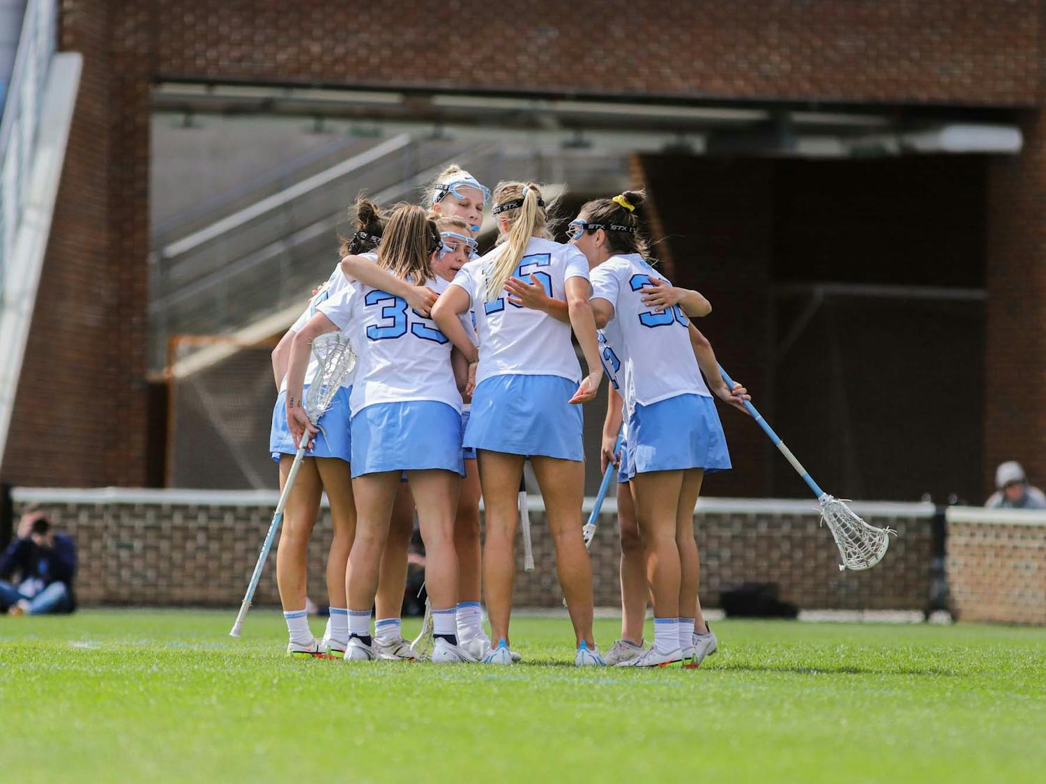 UNC players embrace after a goal against Virginia Tech on Saturday March 26, 2022 at the Dorrance Field in Chapel Hill. The Tar Heels won 20-8.