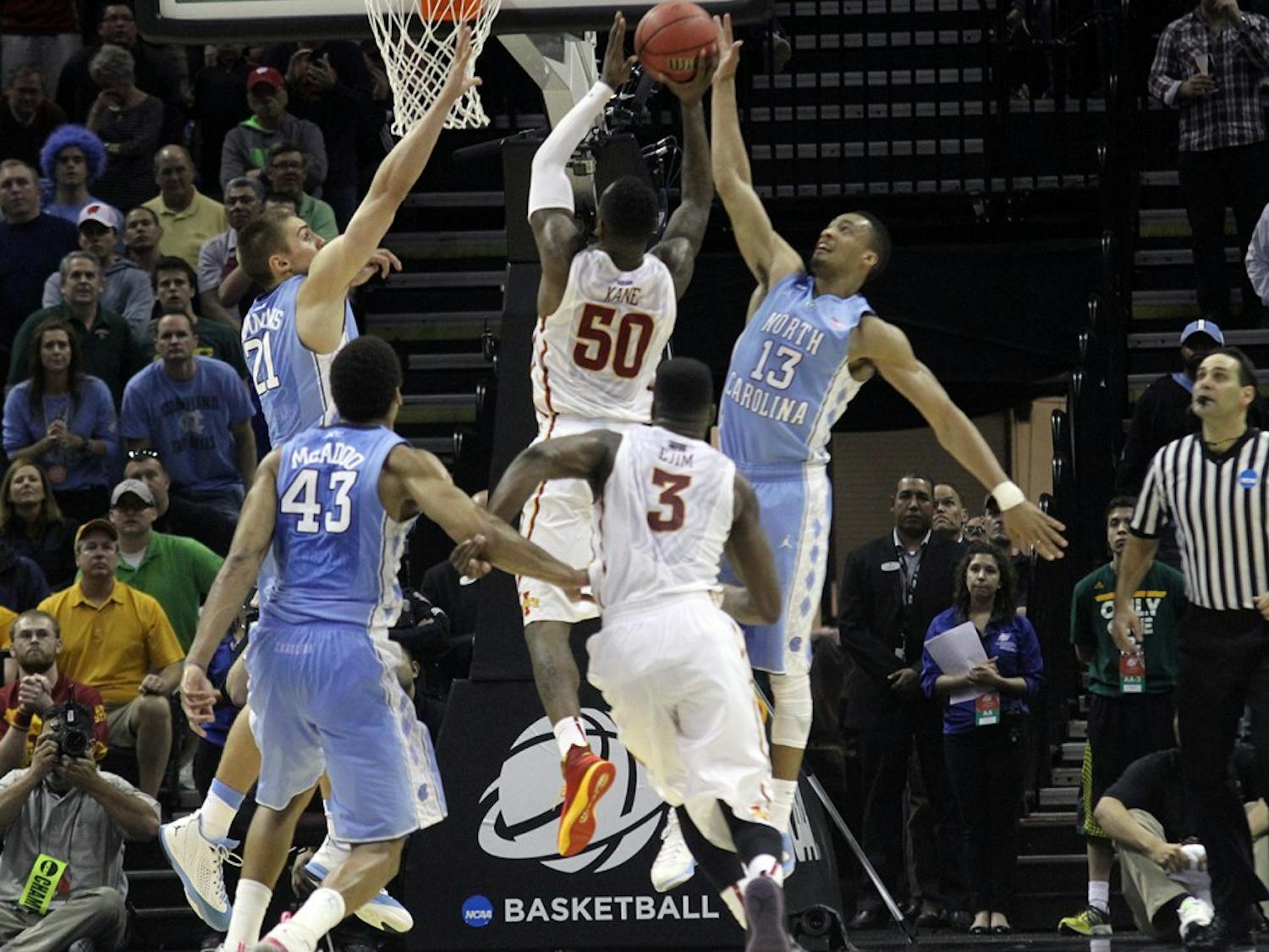 Iowa State's DeAndre Kane hit the game winning shot over Jackson Simmons and JP Tokoto. The UNC men's basketball team lost to Iowa State 85-83 in the third round of the NCAA tournament.