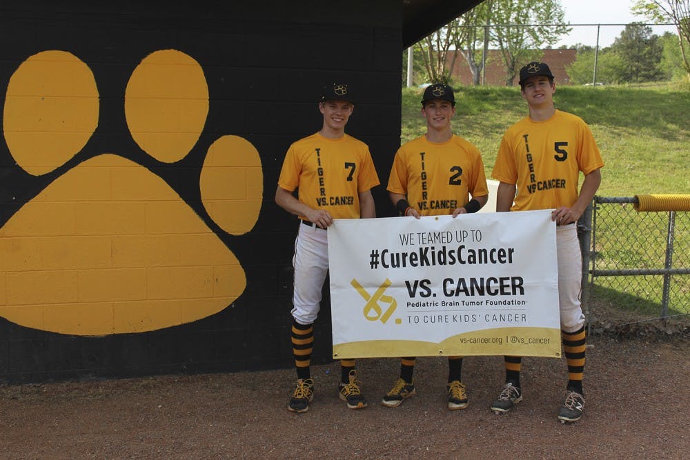 <p>Chapel Hill High School baseball players (from left) Jackson Pettee, Garrett Liebe, and Tyler Hansen planned a fundraiser to raise money for VS Cancer.</p>