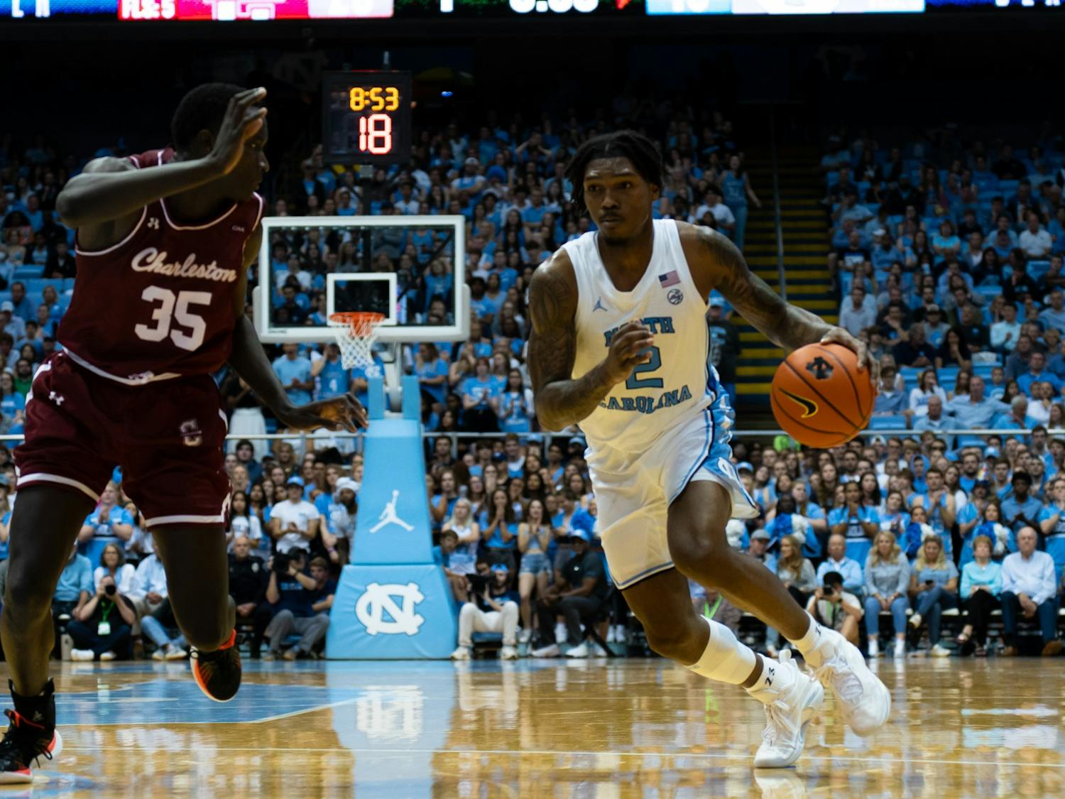 UNC junior guard Caleb Love (2) drives toward the basket during UNC's match against College of Charleston on Friday, Nov. 11, 2022 at the Dean Smith Center.