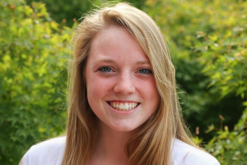 Jenny Surane is the 2014-15 Editor-in-Chief. She is a senior business journalism major from Cornelius.