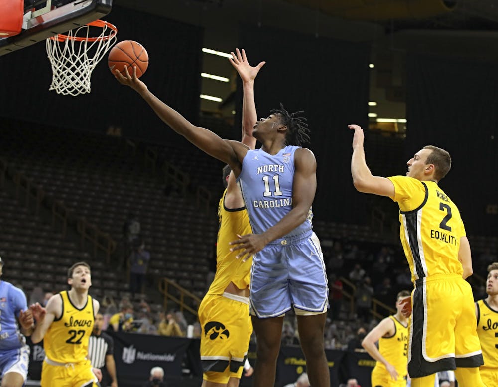 North Carolina Tar Heels forward Day'Ron Sharpe (11) makes a basket during the second half of their B1G/ACC Challenge  game at Carver-Hawkeye Arena in Iowa City, Iowa on Tuesday, December 8, 2020. Photo courtesy of Stephen Mally/hawkeyesports.com