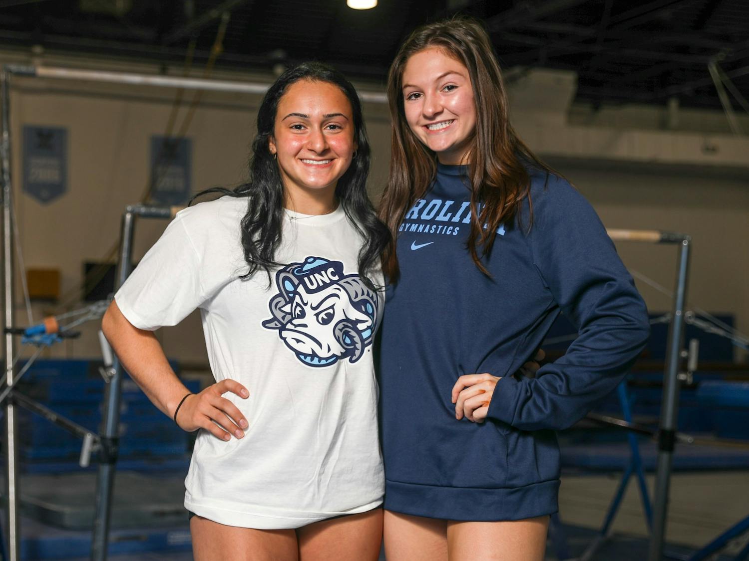 First-year gymnasts Julia Knower and Lali Dekanoidze pose in the practice gym on Thursday, Jan. 27, 2022.
