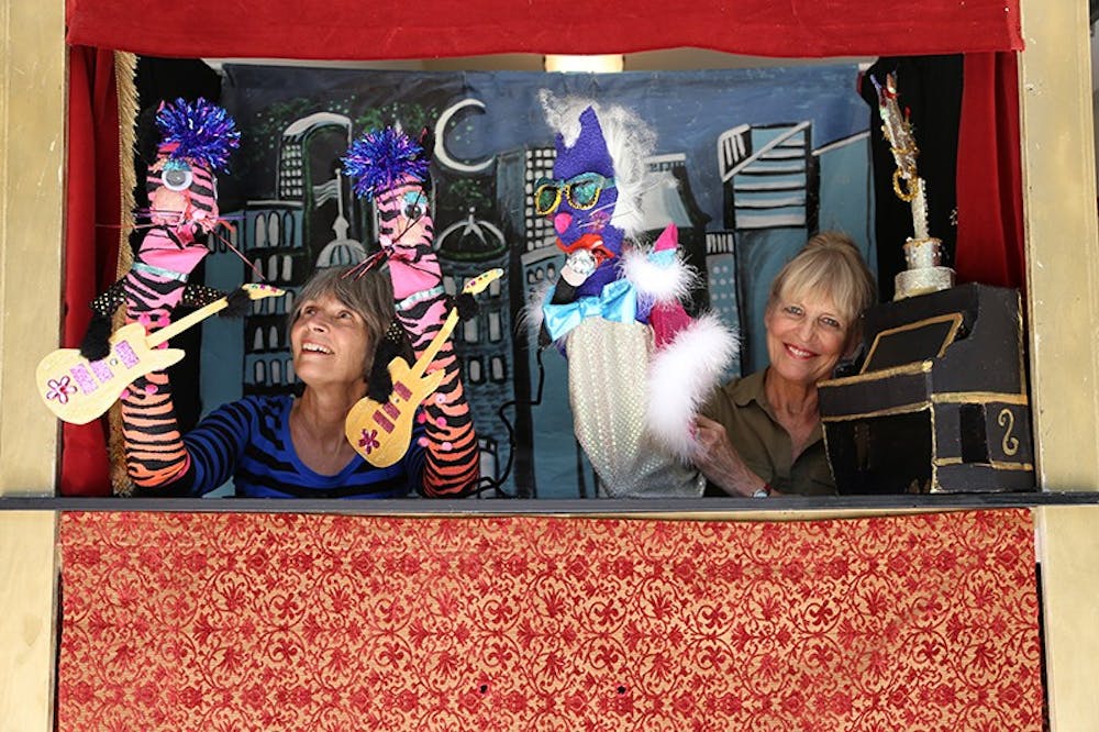 Marianne Gingher (in the green) and Deborah Seabrooke (in the blue) will perform "Unleashed!" at the Carrboro Arts Center Friday and Saturday nights. 

http://artscenterlive.org/event/performance/2456 

http://jabberboxpuppettheater.com/ 