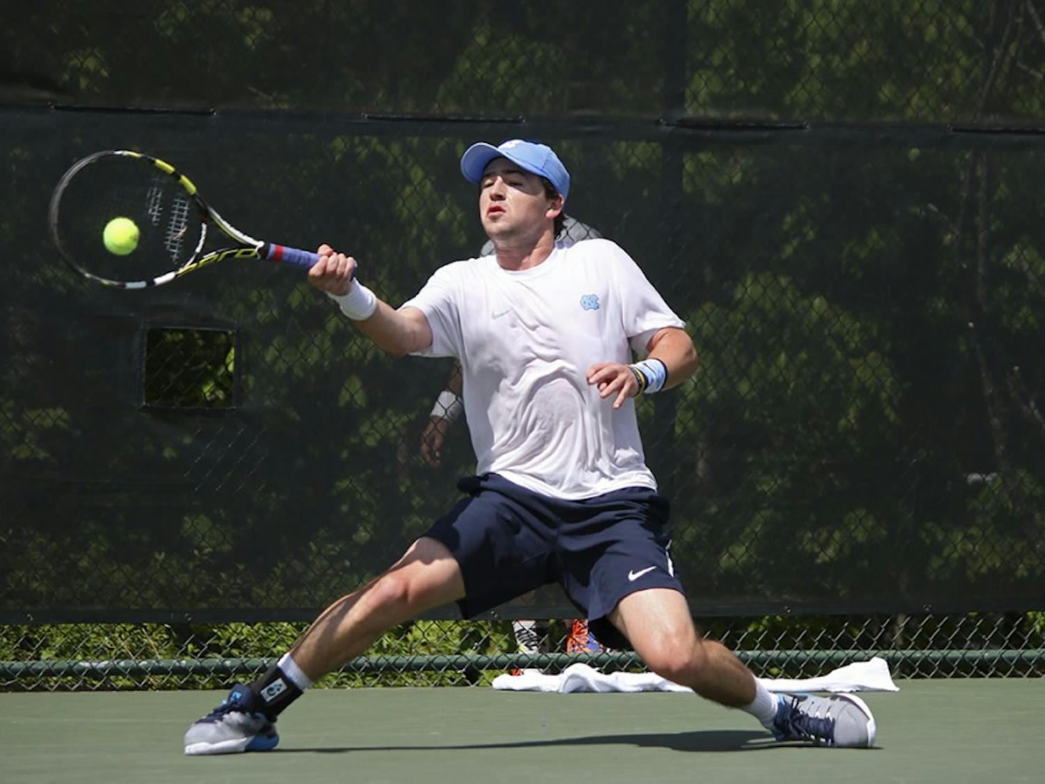 Senior Ronnie Schneider returns a volley in his singles match in the 2016 ACC&nbsp;semi-finals.&nbsp;The UNC men's tennis team lost 4-3 to the University of Virginia in the AC semi-finals on Saturday,&nbsp;April 23rd.