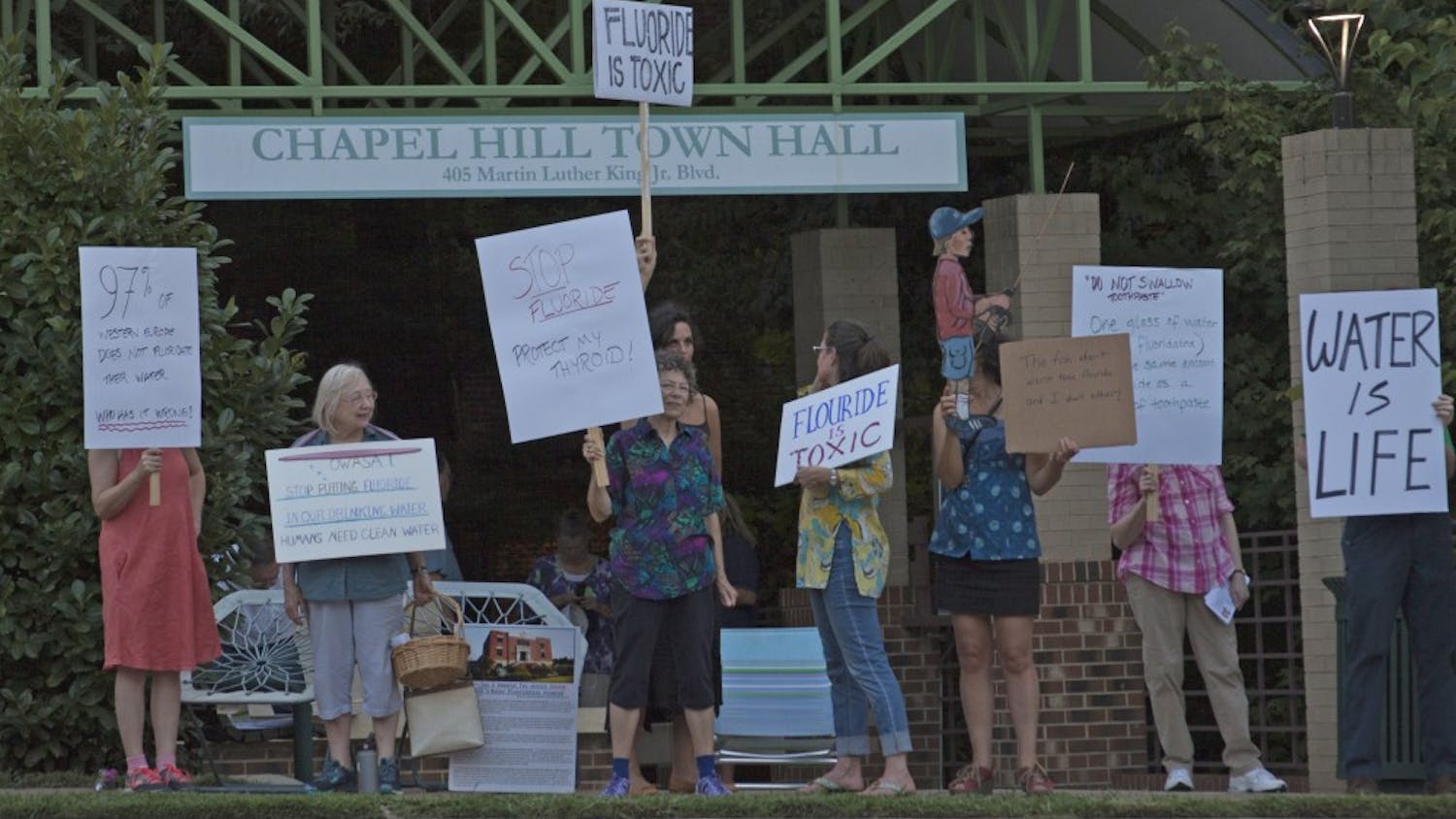 A number of local activists took to the sidewalks outside of Chapel Hill Town Hall on the evening of Thursday, August 24th, to protest the OWASA board's continued fluoridation of Orange County water sources.