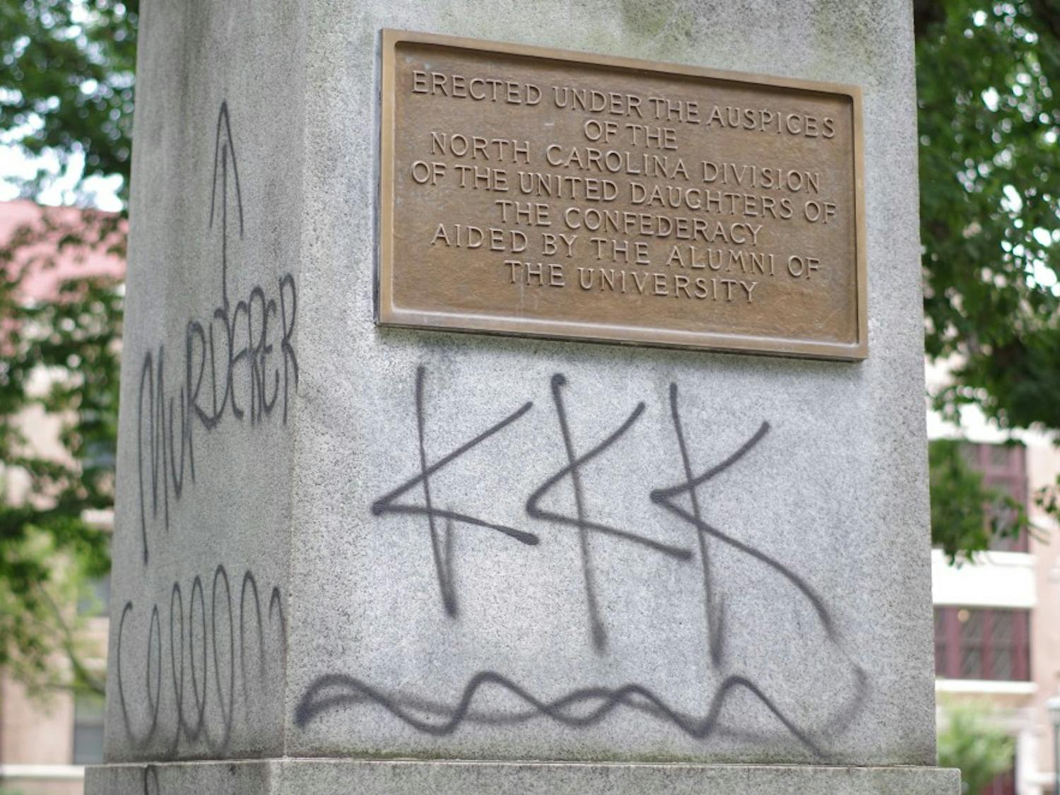 The Silent Sam monument, which is dedicated to students who died serving in the Confederate Army, was spray painted with "black lives matter," "KKK" and "murderer."