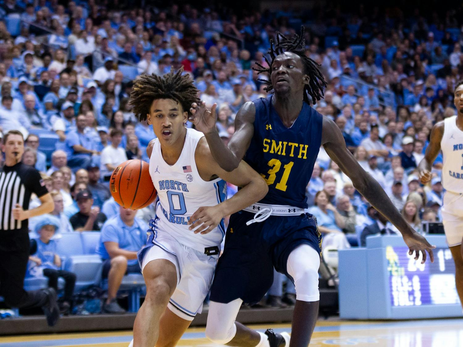 UNC freshman guard Seth Trimble (0) defends the ball during the basketball game against JCSU on Friday, Oct. 8, 2022. UNC beat JCSU 101-40.