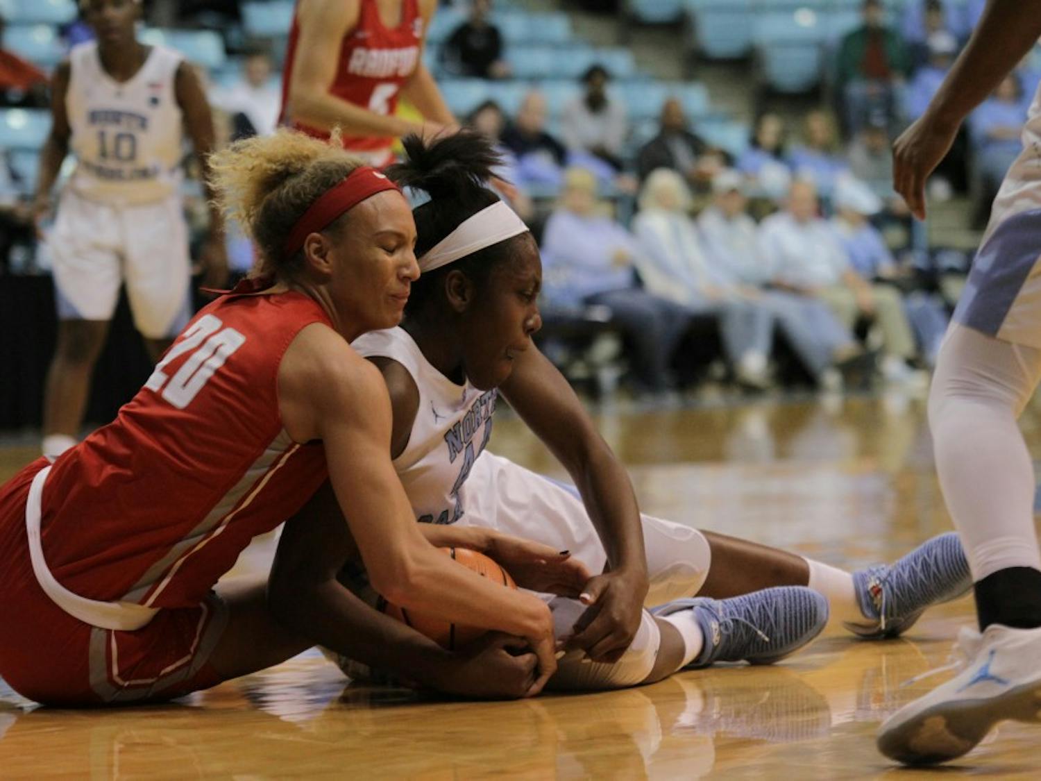 Forward Janelle Bailey (44) fights for a ball against Radford on Thursday night in Carmichael Arena.