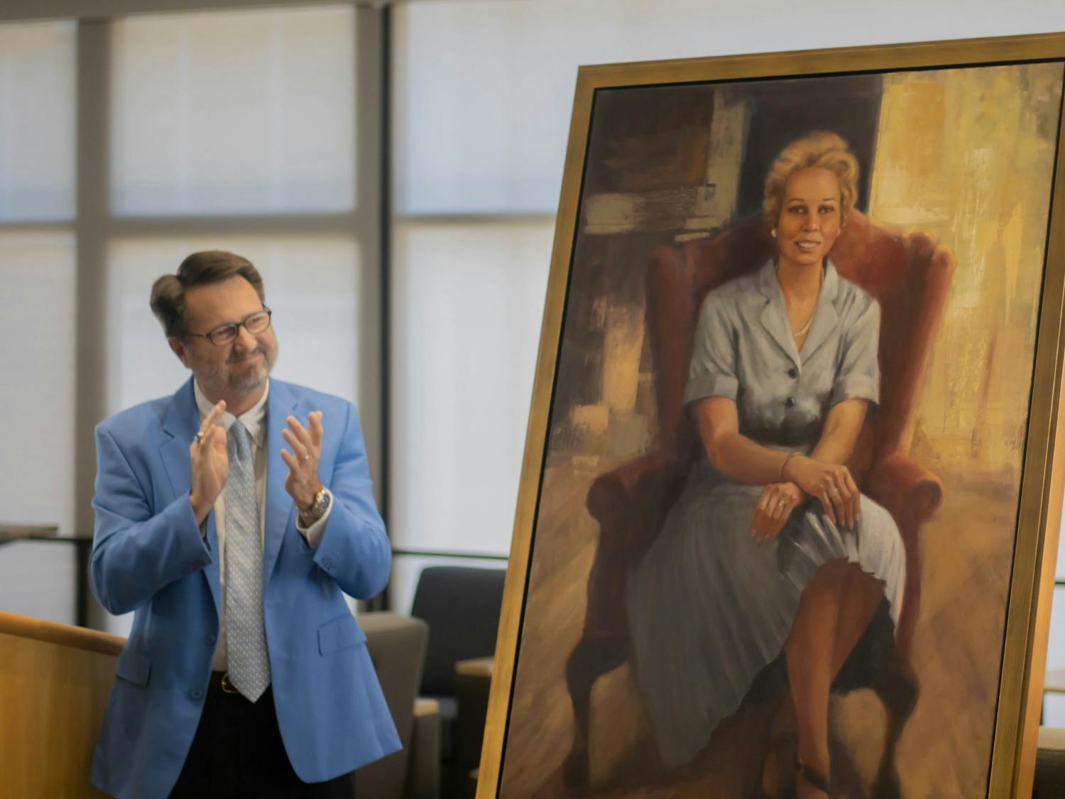 Judge James F. Ammons reacts to seeing the portrait of Sylvia Allen after it has been unveiled on Friday, Nov. 4, 2022, in the Kathrine R. Everett Law Library.