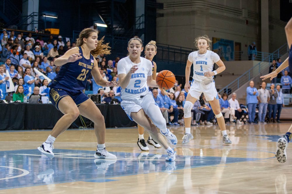 <p>First-year guard Paulina Paris (2) dribbles during the women's basketball game against Notre Dame on Sunday, Jan. 8 at Carmichael Arena. UNC beat Notre Dame 60-50.</p>