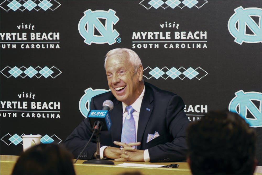 <p>UNC men’s basketball coach Roy Williams answers questions during press conference at Dean Smith Center on Oct. 17.</p>