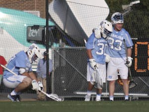 The North Carolina men's lacrosse team shows emotion after losing to No.1 Syracuse 12-11&nbsp;in overtime on Saturday.