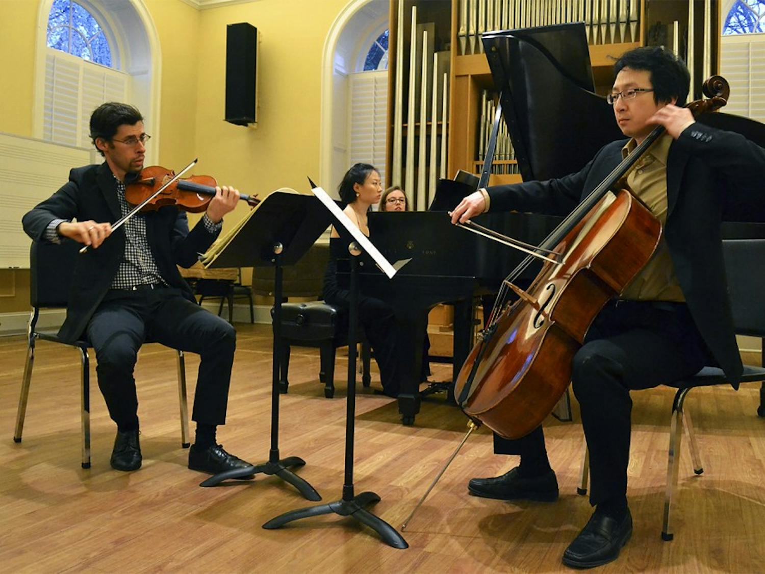Dovid Friedlander (violin), Clara Yang (piano), and Peng Li (cello), perform at the Faculty Recital Monday evening in Person Hall.  UNC pianist, Yang, along with North Carolina Symphony musicians, Friedlander and Li, performed works by Bach, Beethoven, and Brahms.