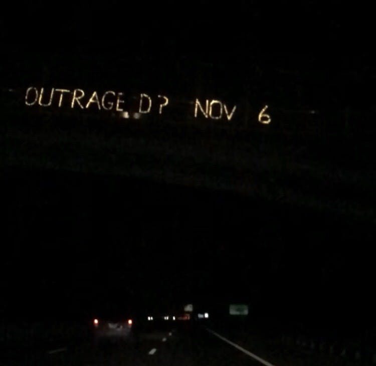 Hillsborough group puts sign over I-40 to protest Kavanaugh