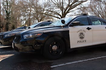 Chapel HIll Police vehicles standby at the Chapel Hill Police Department on Tuesday, Jan. 28, 2020. The Chapel Hill Police Department has increased their patrols in and around UNC's Campus in response to the sexual assault in the Shortbread Lofts parking deck.