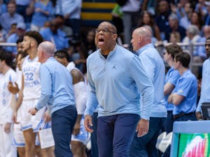 UNC head coach Hubert Davis yells from the sidelines during the men's basketball game against Duke at the Dean E. Smith Center on Saturday, March 4, 2023. UNC fell to Duke 62-57.