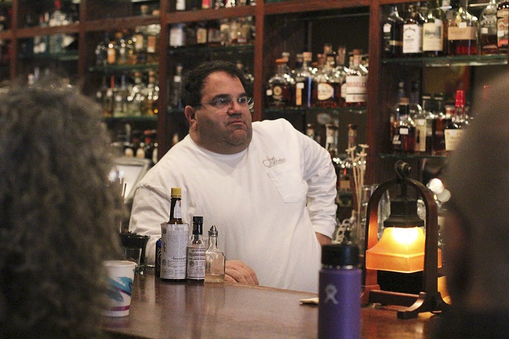 Owner Gary Crunkleton speaks at the bar The Crunkleton on Franklin Street Thursday morning.
