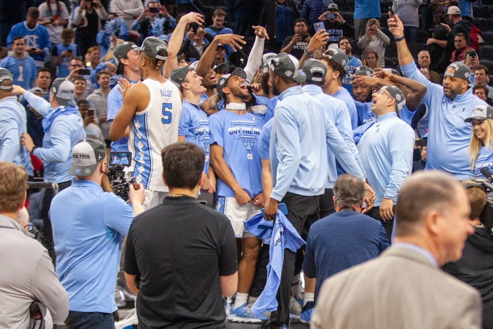 <p>The UNC Men's Basketball Team celebrates after beating St. Peter's in the Elite 8 game of the NCAA tournament &nbsp;at the Wells Fargo Center in Philadelphia. UNC won 69-49 and advanced to the Final Four. &nbsp;</p>