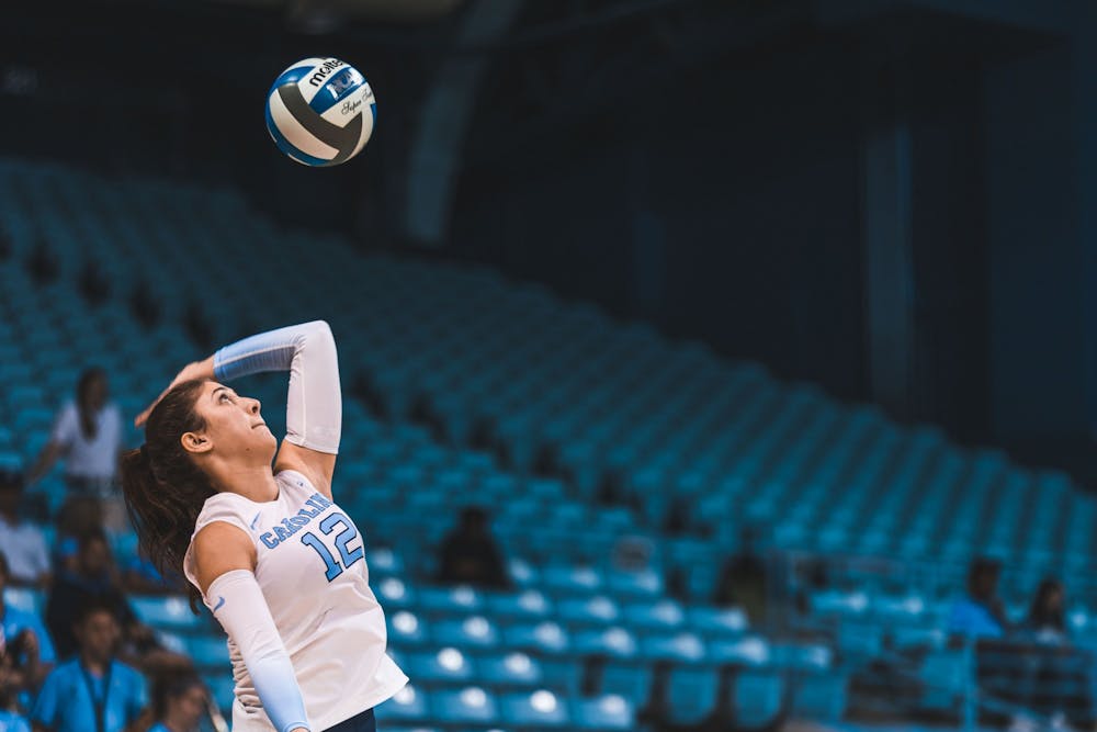 UNC freshman Anita Babic (12) serves during the second set of the volleyball game against Boston College on Friday, Oct. 14, 2022. UNC won 3-0.