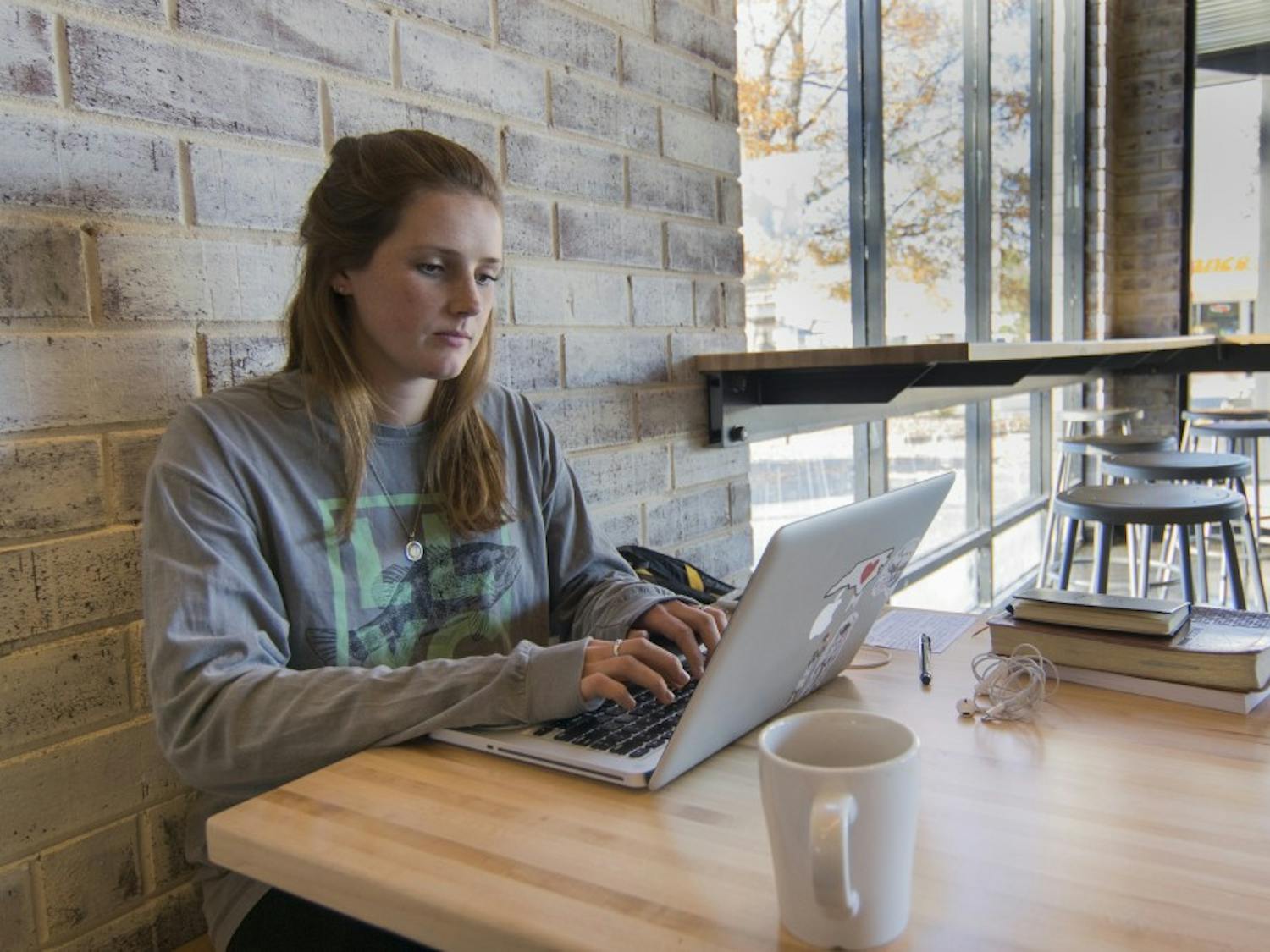 Courtney Beals, senior at UNC, loves to study at Gray Squirrel Coffee. "They have big windows, a lot of natural lights and their coffees are relatively cheap," said Beals.