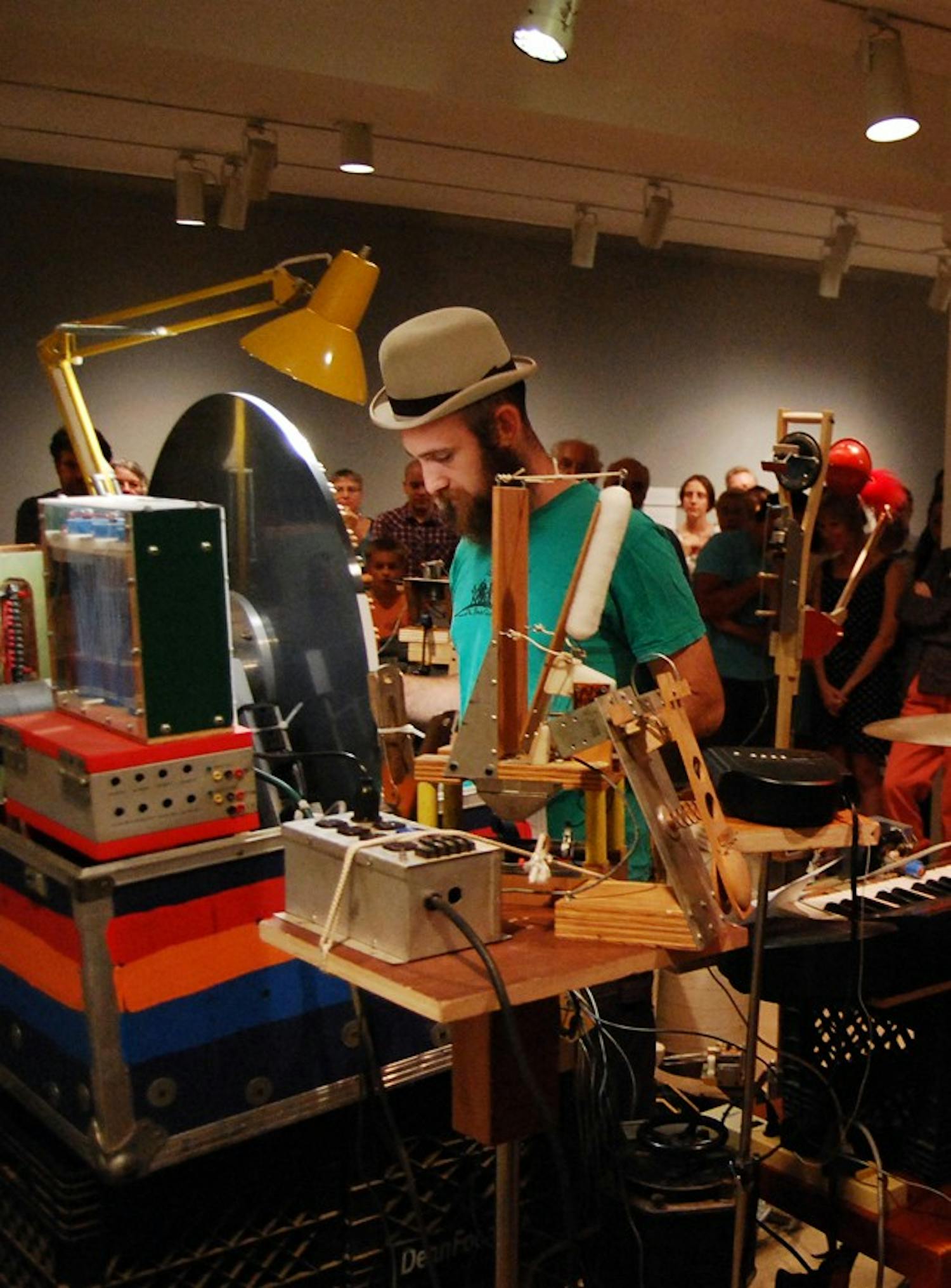 Mark Dixon of the alternative home-made music project INVISIBLE performs for a crowd at Ackland Art Museum on Thursday night.