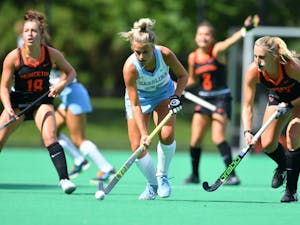 First-year midfielder Jasmina Smolenaars (22) goes for the ball in a field hockey game against Princeton on Sept. 5. Photo courtesy of Greg Carroccio/Princeton Athletics.&nbsp;
