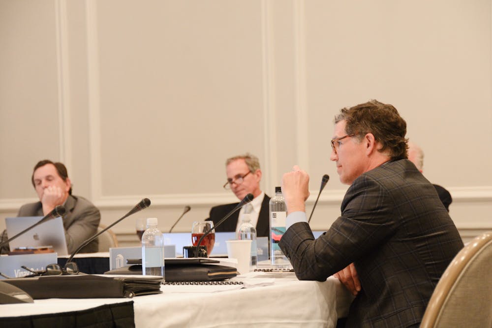 <p>Members of the Board of Trustees listened as Mimi Chapman, chairperson of the Faculty, spoke in front of the board on Wednesday, 22, 2023. From left to right: Robert Bryan III, John Preyer and Perrin Jones.</p>