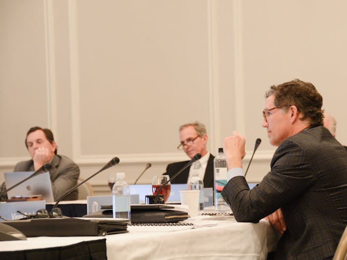 Members of the Board of Trustees listened as Mimi Chapman, chairperson of the Faculty, spoke in front of the board on Wednesday, 22, 2023. From left to right: Robert Bryan III, John Preyer and Perrin Jones.