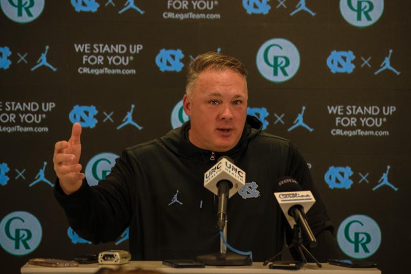 New coordinator Geoff Collins challenges UNC's defense to be more aggressive