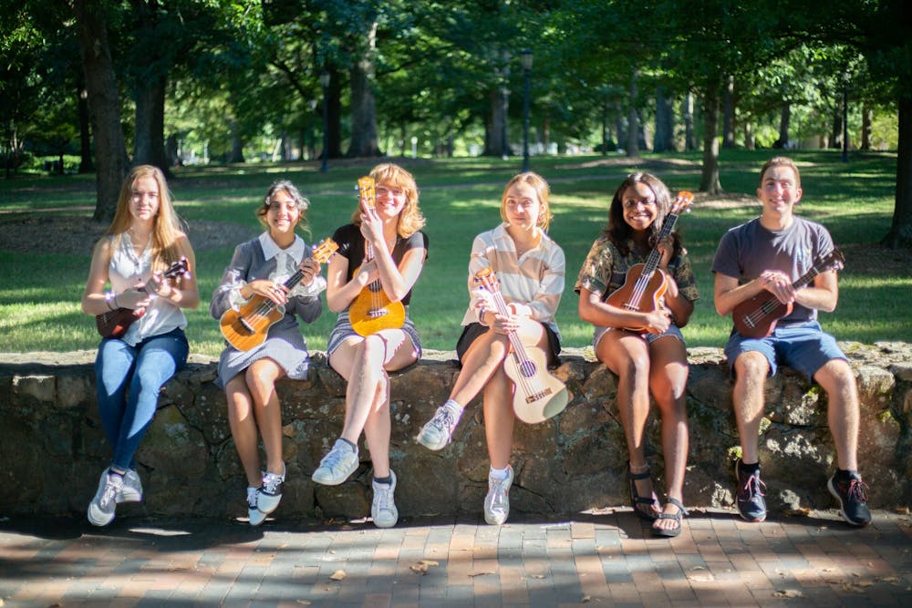 (from left to right) Robyn Ardern, Isabela Peterson, Anna Keener, Helen Abbott, Chiazo Agina, and Matthew Wasyluk pose with their ukuleles on Sept. 24.
