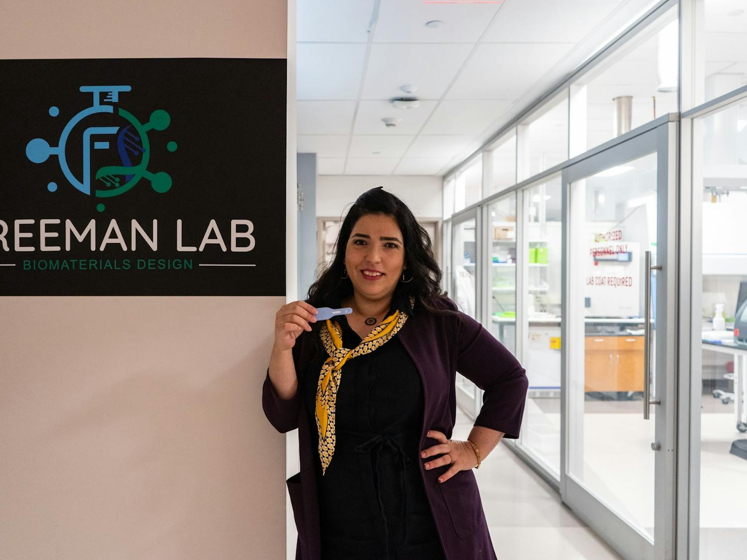 Dr. Ronit Freeman poses for a portrait with the new GlycoGrip COVID-19 testing strip at the Freeman Lab on Monday, Jan. 10, 2022. The GlycoGrip features a sugar-coated exterior that mimics the structure of a cell, making it possible for the virus to be detected.