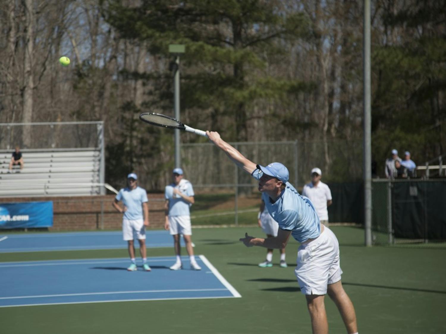 Sophomore Mac Kiger serves against Miami on Sunday, March 24 2019 at Cone-Kenfield Tennis Center. UNC defeated Miami 4-1. 