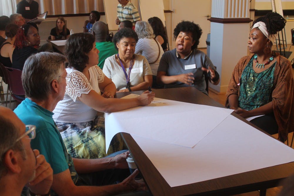 <p>Parents and teachers discuss racial inequalities in the Chapel Hill-Carrboro City School system at the Carrboro Century Center in September of 2017.&nbsp;</p>