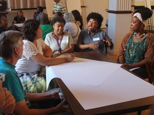 Parents and teachers discuss racial inequalities in the Chapel Hill-Carrboro City School system at the Carrboro Century Center in September of 2017.&nbsp;
