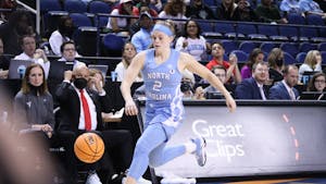 Graduate student guard Carlie Littlefield (2) sprints after the ball at the NCAA Sweet 16 game in Greensboro, NC, on Friday, March 25, 2022. UNC lost 61-69 against South Carolina.