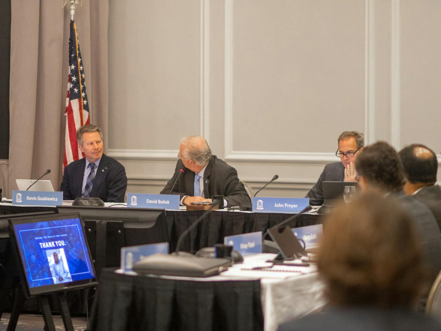 UNC Board of Trustees Chair David L. Boliek speaks next to Chancellor Kevin Guskiewicz at the Board of Trustees meeting at the Carolina Inn on March 23, 2023.