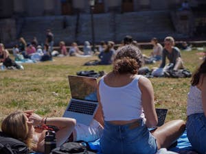 Students embrace the spring weather on the quad on Wednesday, Feb. 24, 2021.
