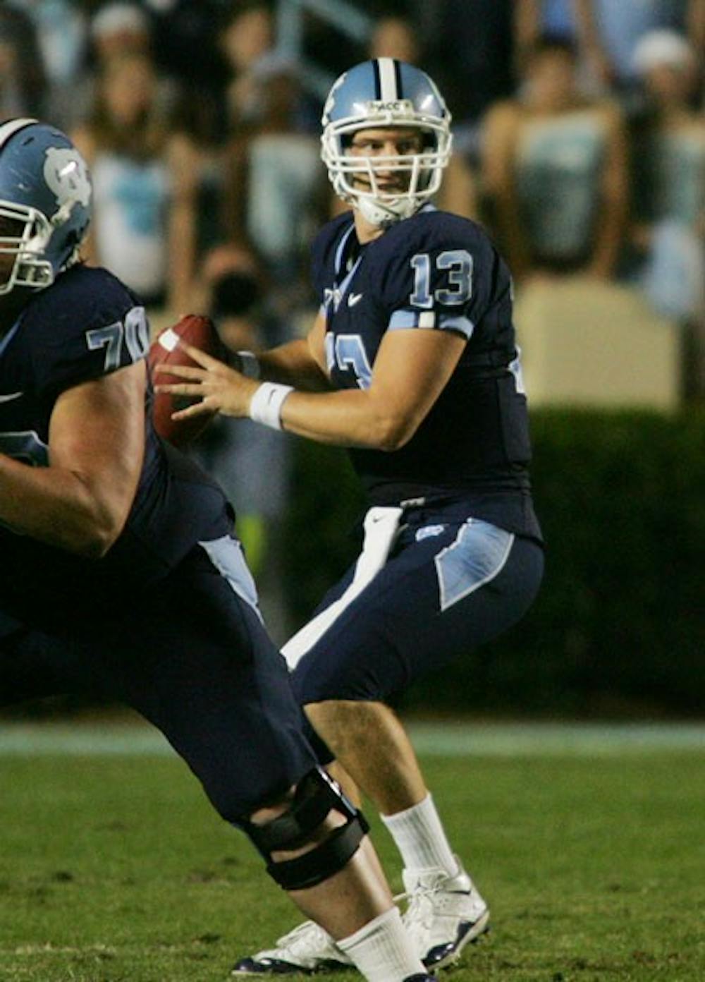 UNC quarterback T.J. Yates (13) has taken heat as the Tar Heels have dropped three of their last four. DTH/Andrew Dye
