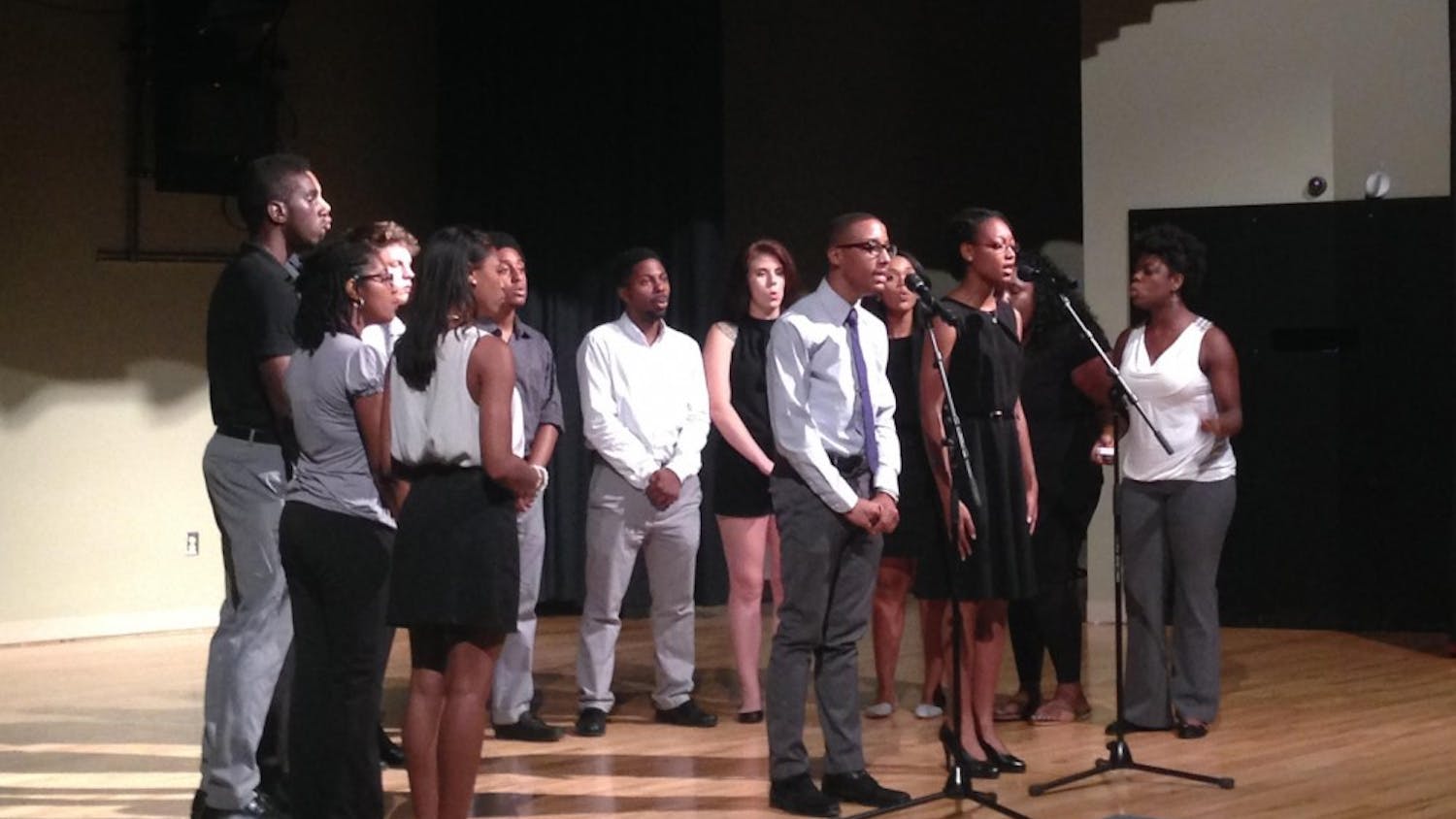 The Harmonyx, a sub group of the Black Student Movement, performs as a part of a BSM meeting.