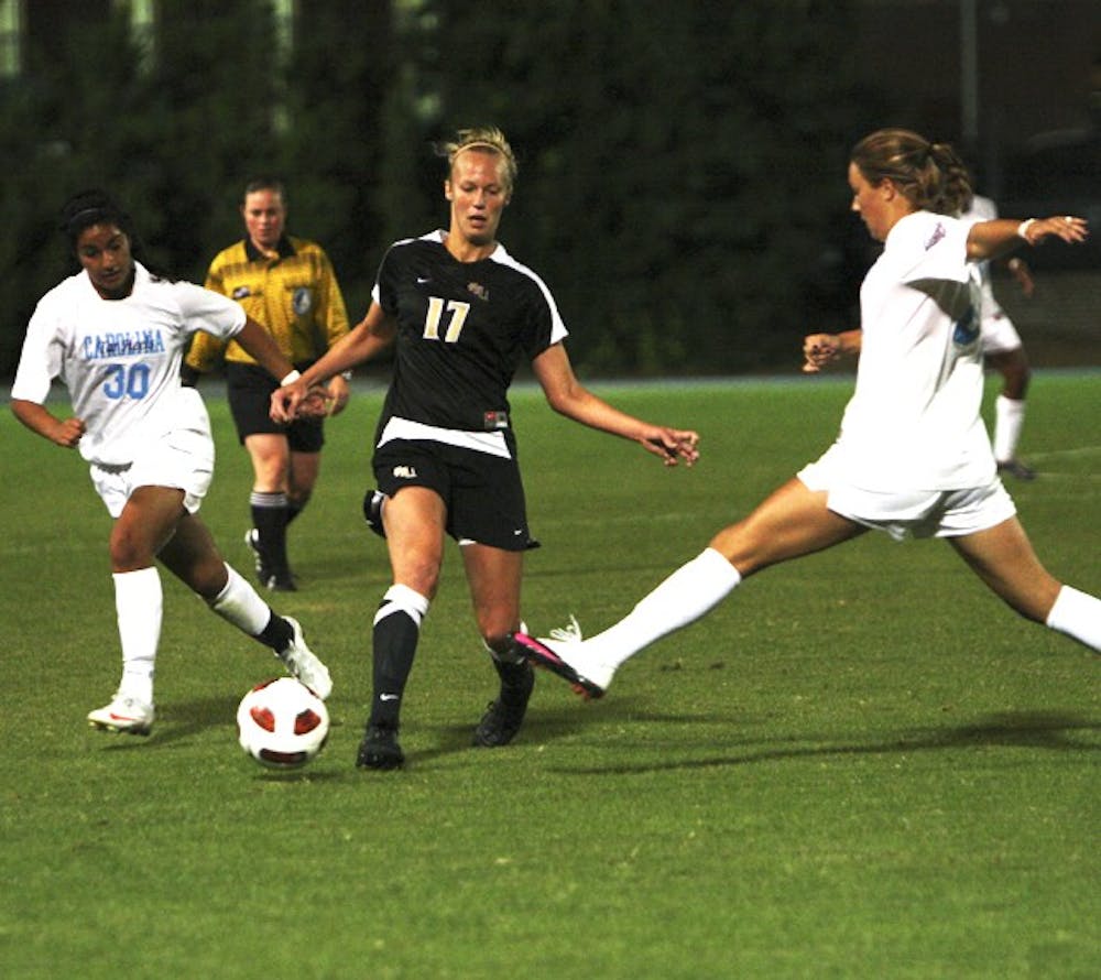 Courtney Jones (right) would eventually feed Ranee Premji (30) the ball in the 87th minute for UNC’s lone goal against Florida State on Thursday.